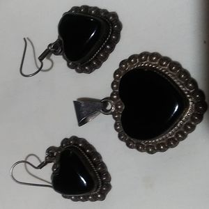 Sterling silver heart shaped pendant and pierced earrings with black stones